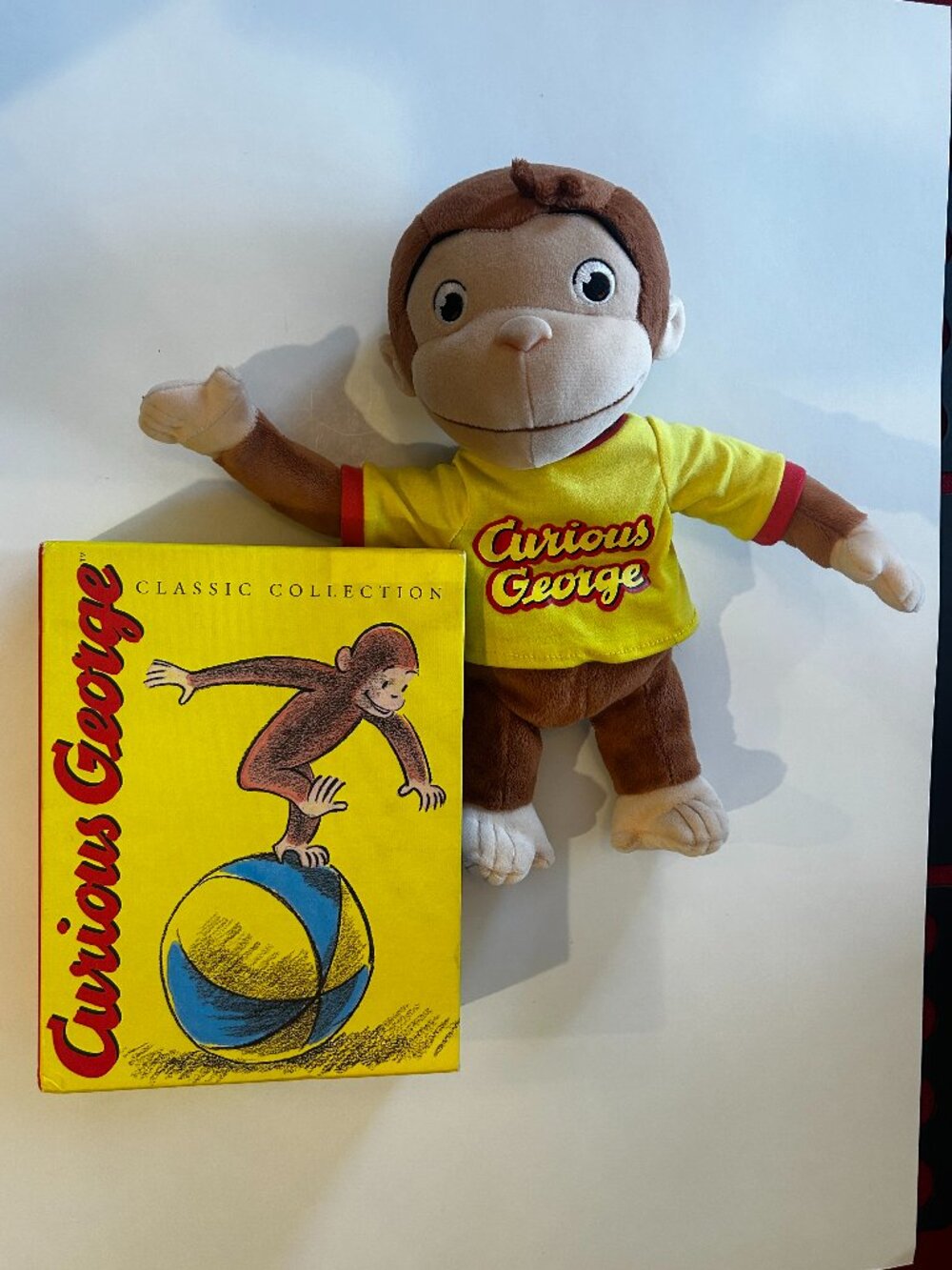 Curious George 7 Hardback Book Set with Giggling Curious George Stuffed Animal.